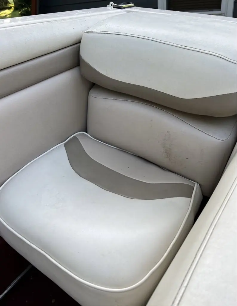 Boat seat before detailing, dull and dirty