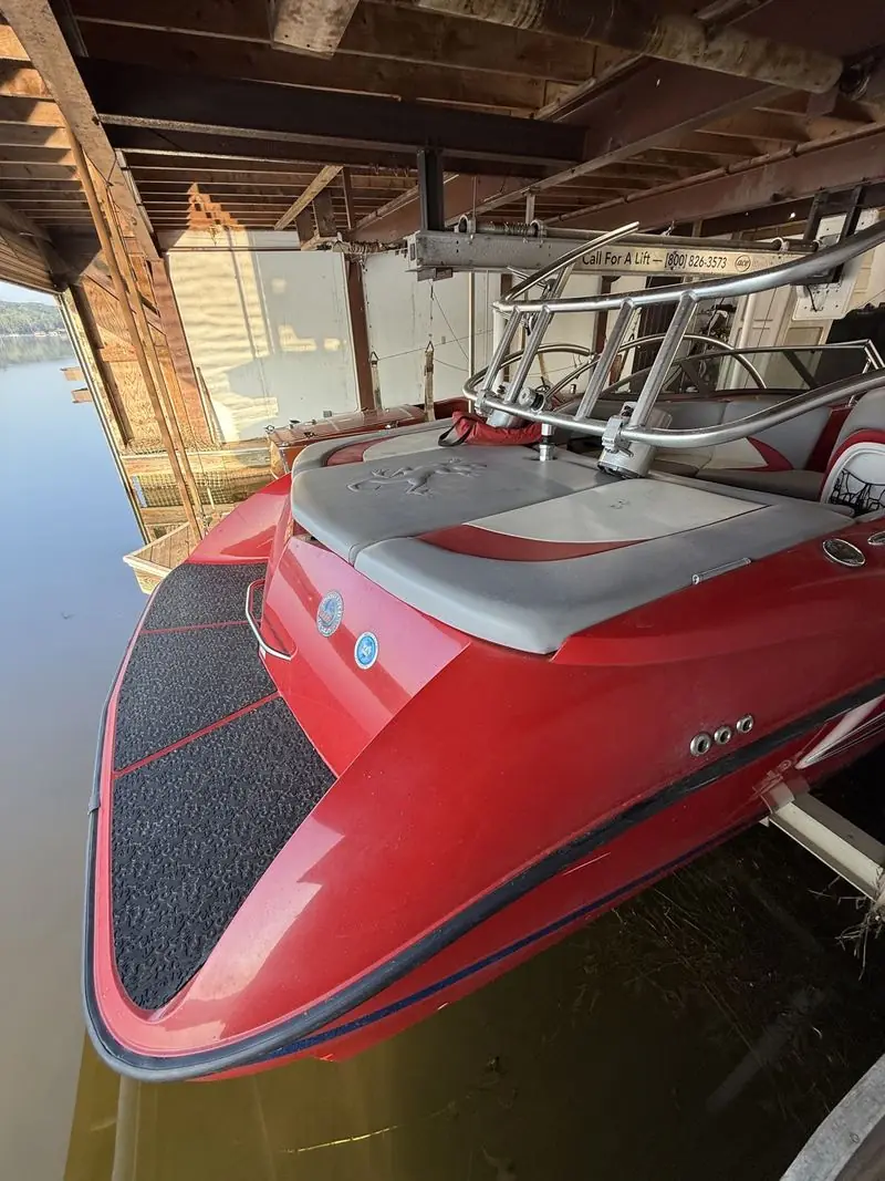 Red bow in a boat house before detailing