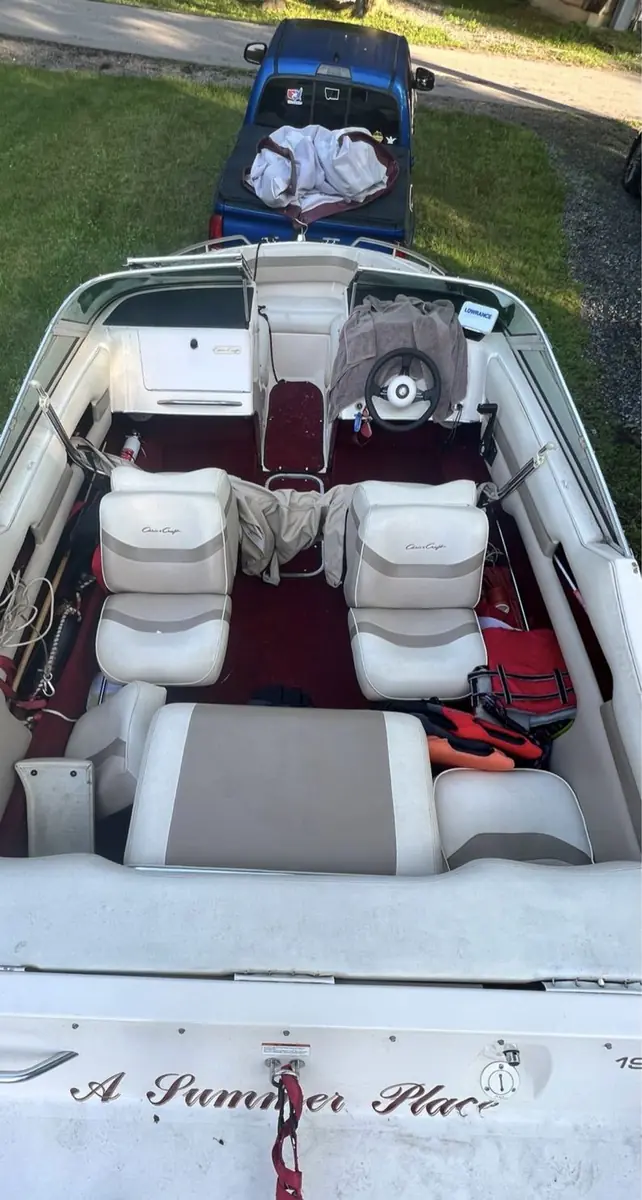 Runabout cockpit before detailing, with dirty seats and carpet