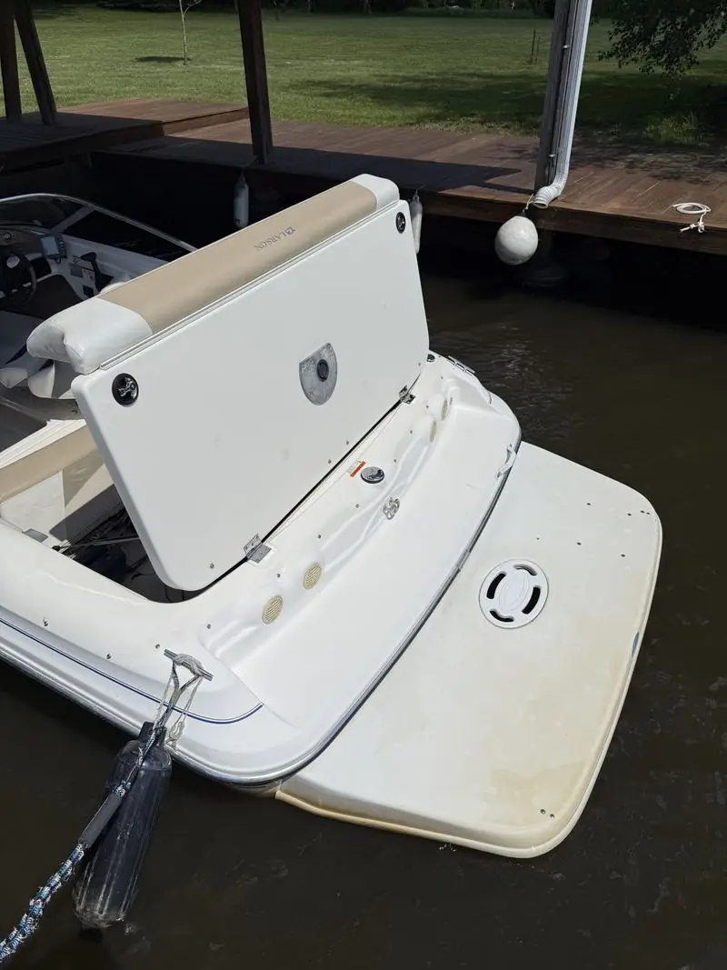 The same swim platform after detailing, clean and bright
